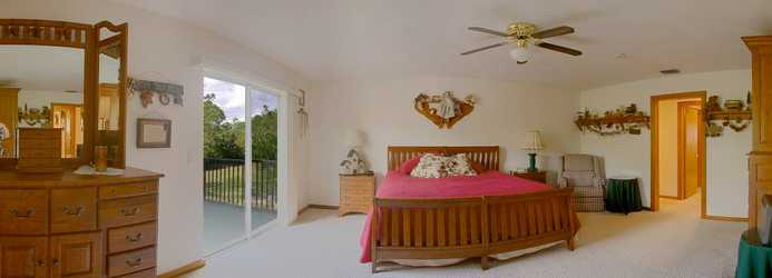 Slideshow of vacation rental property 8000 square ft red cedar log home on 2 acres in Cape Coral