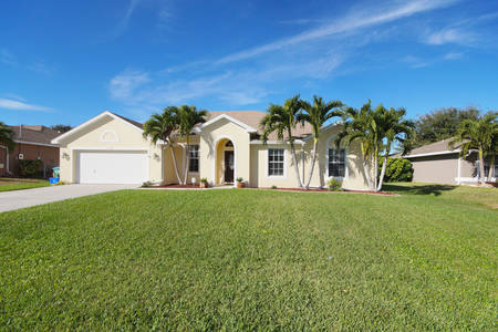 Slideshow of vacation rental property Beautiful home with ample room for raising a family! Plenty of room for a pool. in Cape Coral