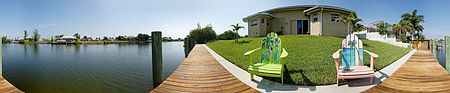 Immobilien 4/4 Courtyard Pool Home - custom pool w/large gulf access canal in Cape Coral